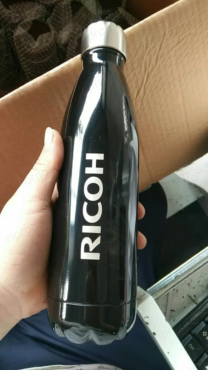 Cola-shaped vacuum flask