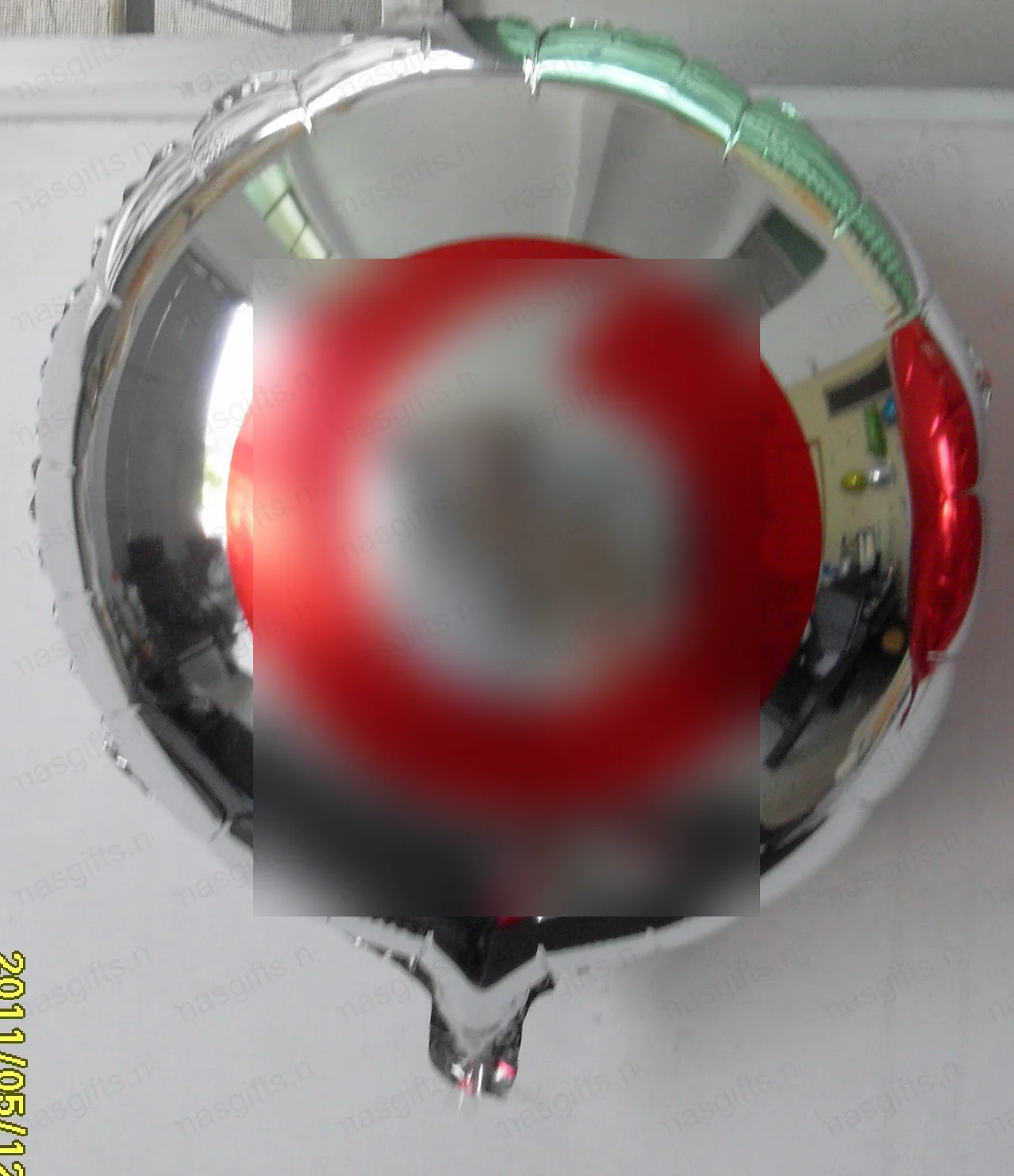 Vodafone silver foil balloon with red speechmark logo